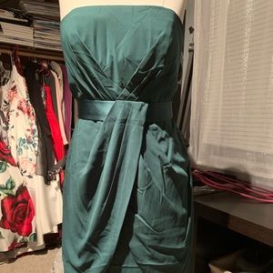 Strapless dress with tulip skirt and satin belt